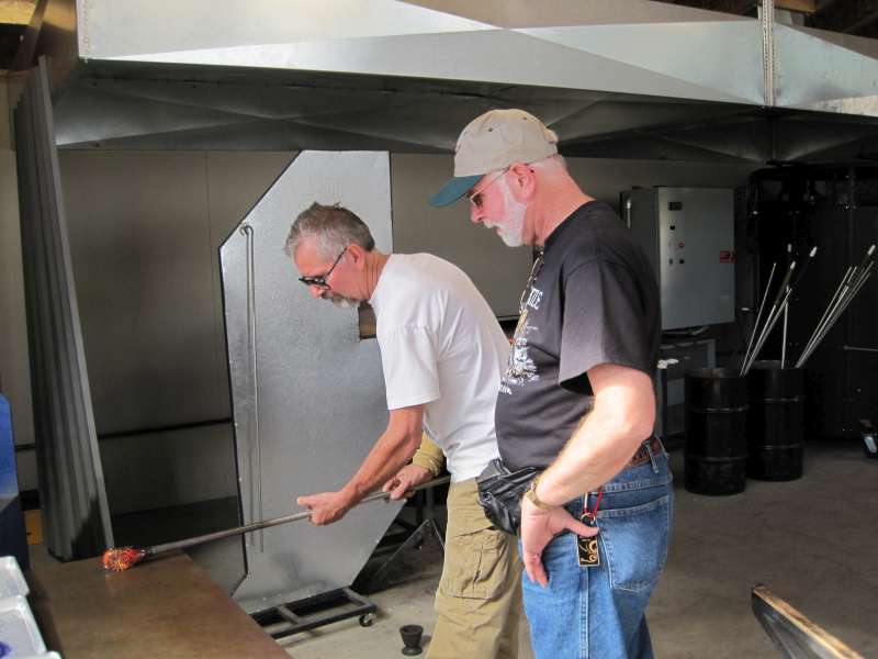 Working the molten glass