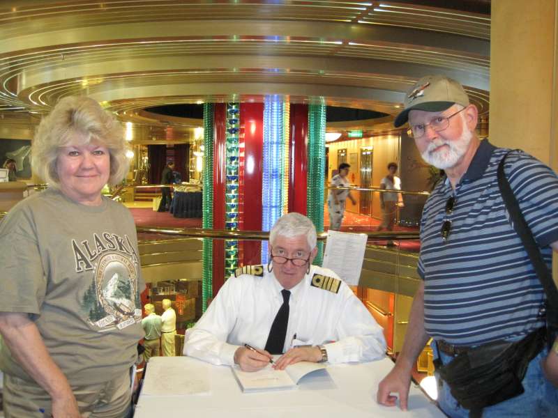 Ship's captain - Peter Bos, signing our book