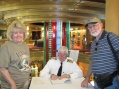 Ship's captain - Peter Bos, signing our book